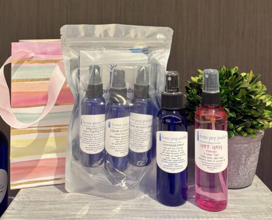 Assorted home spray bottles and gift bag